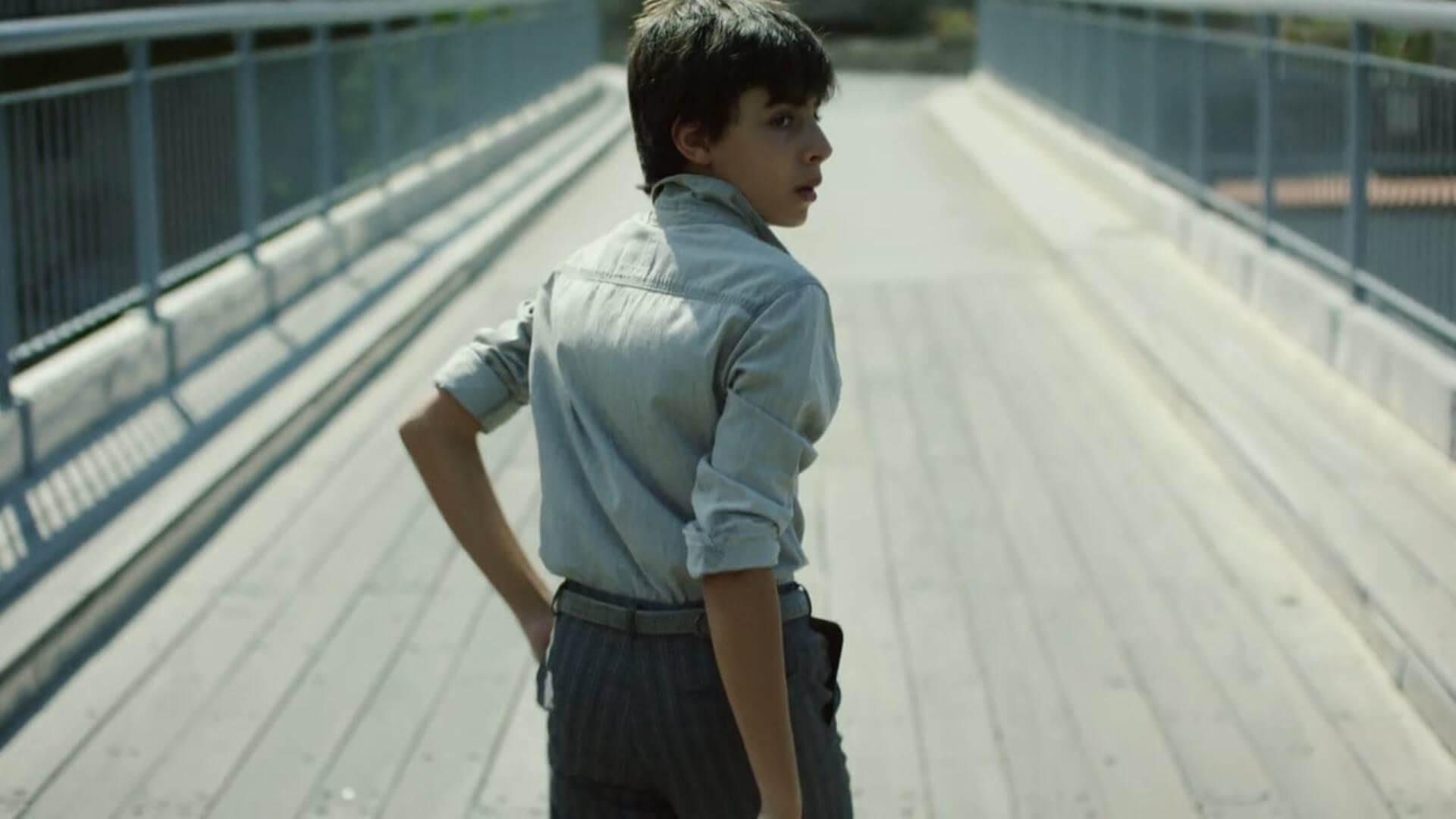 The boy his bike. Carey m r "boy on the Bridge".